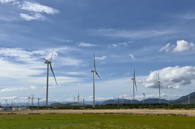 Windmills for electric power production in Vietnam Wind turbines farm windmill farm producing green energy on natural background Renewable Energy concept technology landscape