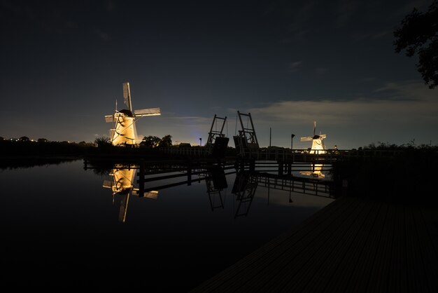 The windmills in Kinderdijk are illuminated