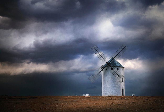 Windmills at sunset in castilla landscape photo