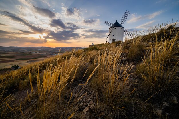 Windmills at sunset in Consuegra CastileLa Mancha Spain