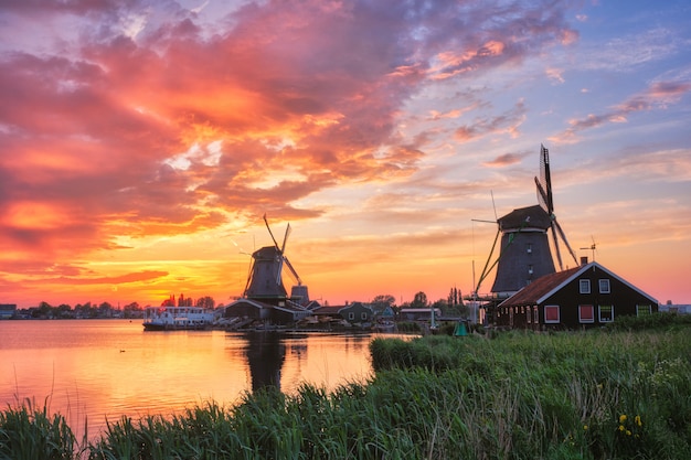 Windmills at Zaanse Schans in Holland on sunset. Zaandam, Nether