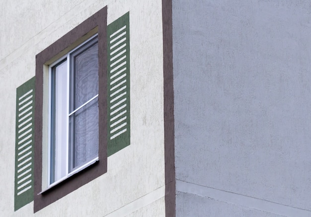 Window against a wall of a multistory building.