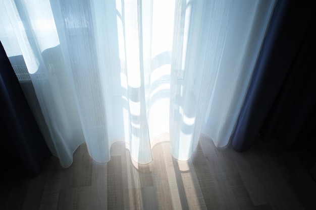 Window and beautiful curtains in flat