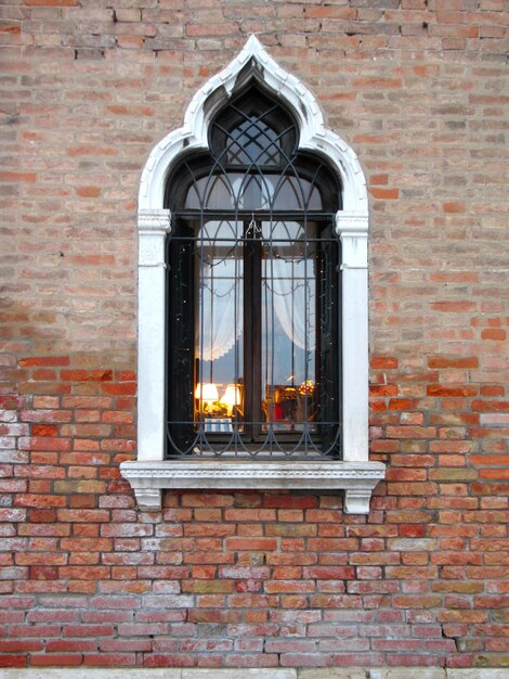 Photo window on brick wall of house