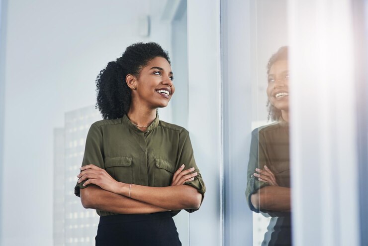 Photo window business and black woman with arms crossed thinking and ideas with startup decision and problem solving african person happy consultant and entrepreneur in modern office view or solution