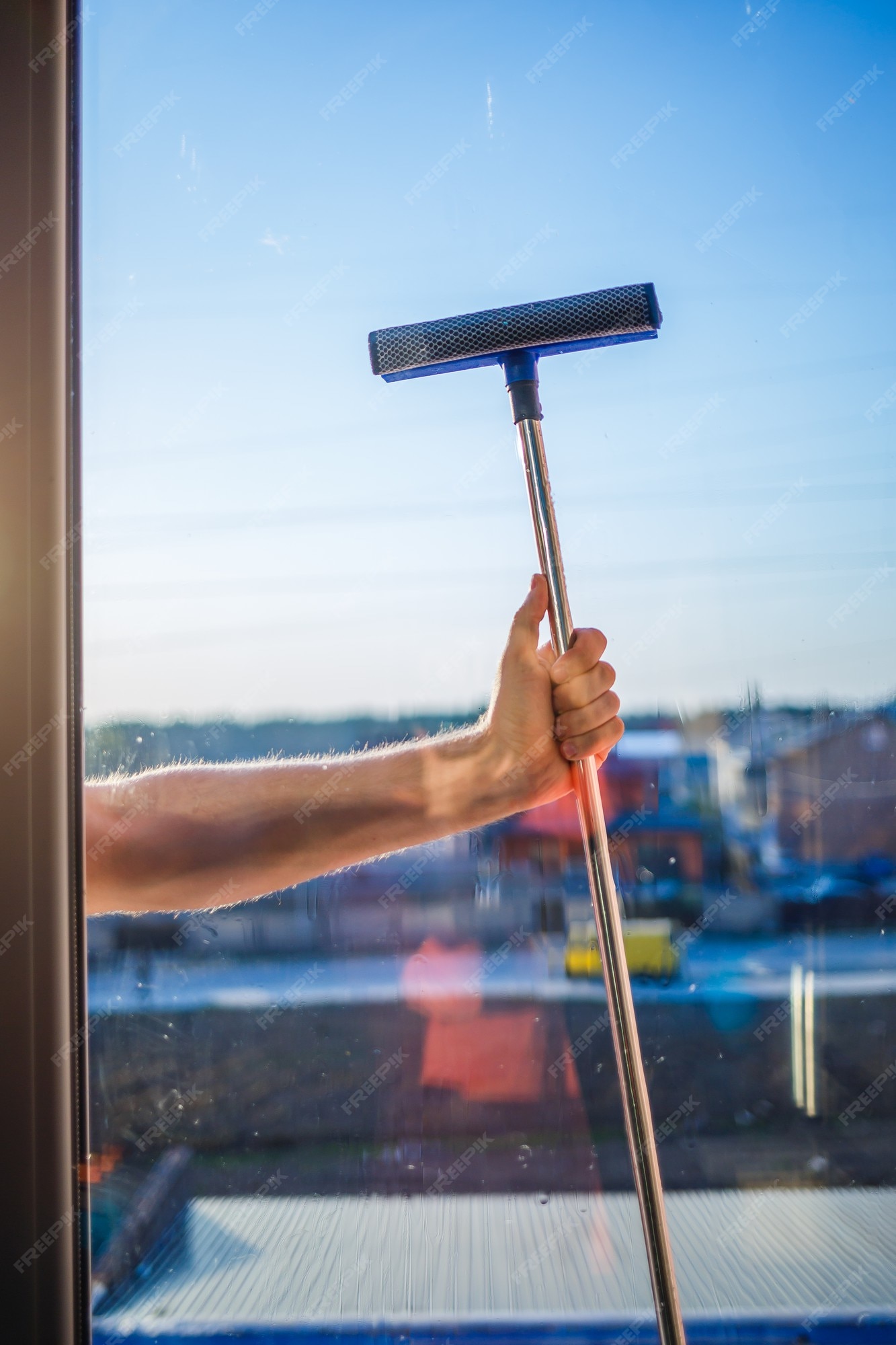 https://img.freepik.com/premium-photo/window-cleaning-high-rise-buildings-houses-with-brush-window-cleaning-brush-large-window-multi-storey-building-cleaning-service-dust-removal-glass-washing_173815-15360.jpg?w=2000