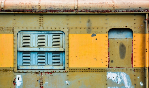 Window of old and rusty bogie train