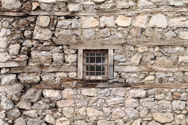 Photo window on old stone wall