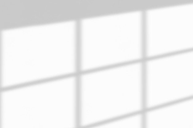 白い壁の背景にウィンドウシャドウドロップ