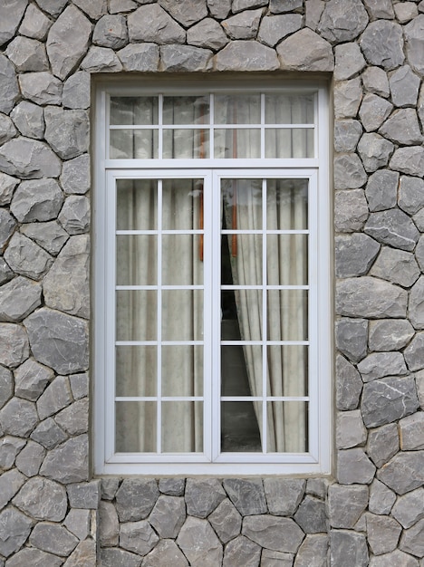 Window on stone wall.