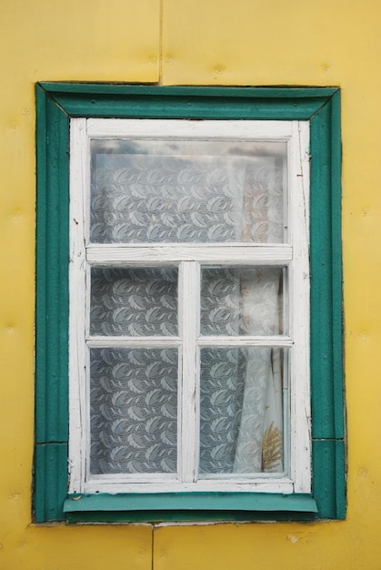 Photo window in a village house wooden window