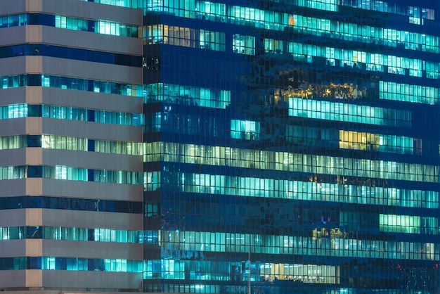 Windows of office buildings illuminated at night 