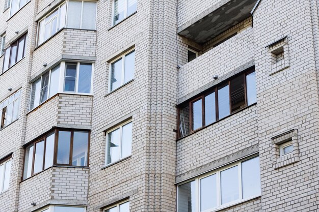 Windows of a tall house close up