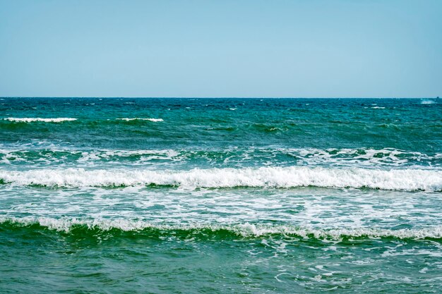 Windy weather. Waves on the sea. Sea coast. Skyline. Sunny day. Mediterranean Sea at winter season