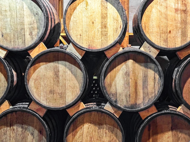 Wine barrels winery aging process in wooden containers