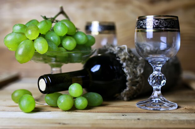 Wine bottle book and glass grape