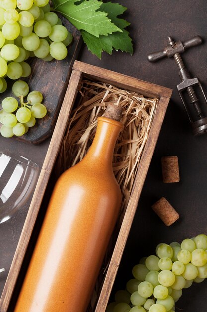 Wine bottle and grapes