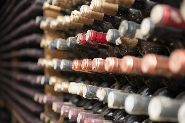 Wine bottles on rack in storage compartment