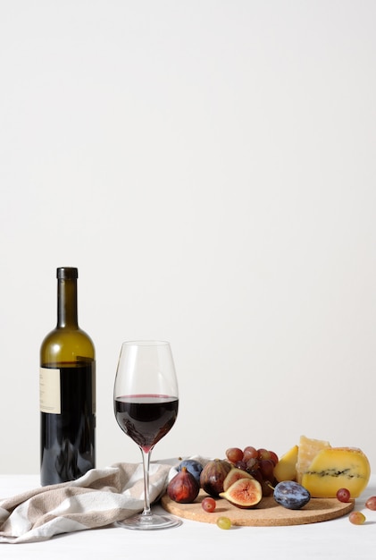 Wine, cheese and fruits
