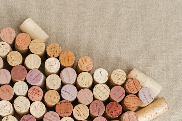 Wine corks on fiber background