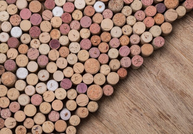 Wine corks over rustic wooden table