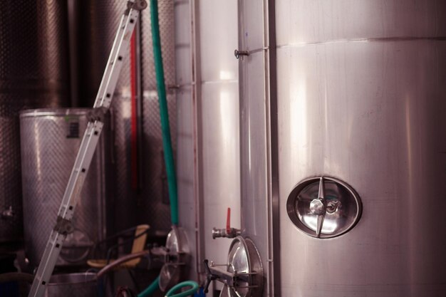 Photo wine factory with new large tanks for the fermentation technological equipment