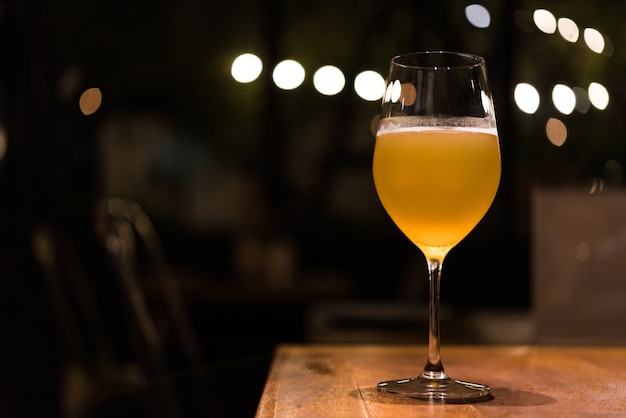 wine glass of beer at relax moment in restaurant