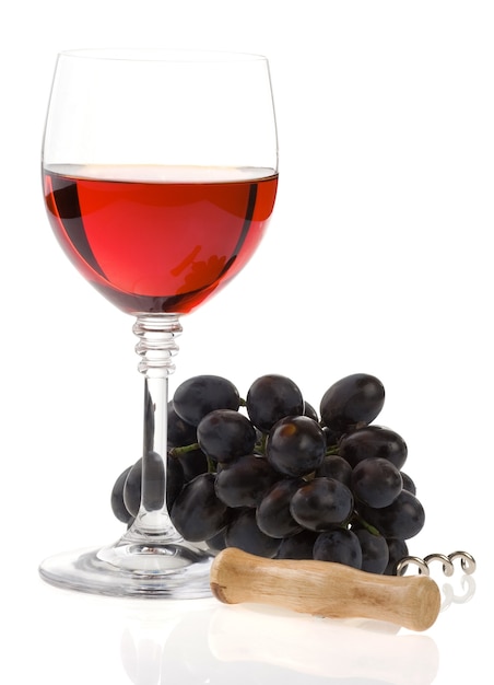 Wine in glass and grape fruit isolated on white background