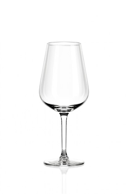 Foto bicchiere di vino sul muro bianco