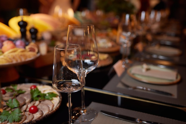 Wine glasses in warm light loft restaurant