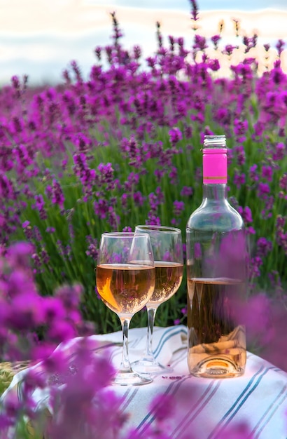 Wine in a lavender field Selective focus