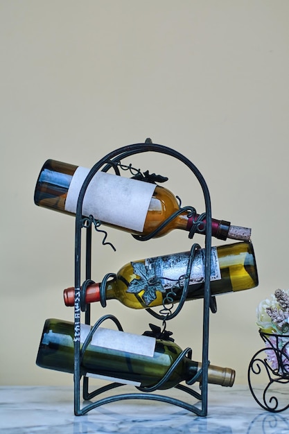 A wine rack with a bottle of wine on it