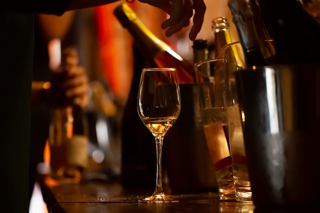 Wine tasting: a glass with the remains of wine is on the table.