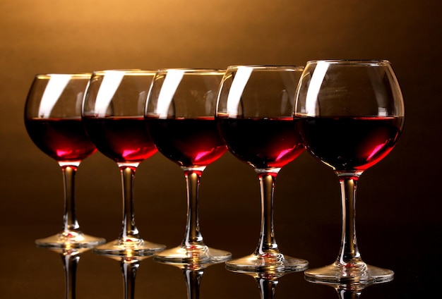 Wineglasses on brown background