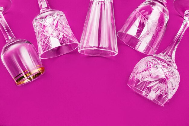 Wineglasses on fuchsia background