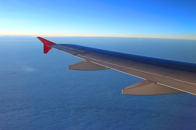 Wing and sky from airplane