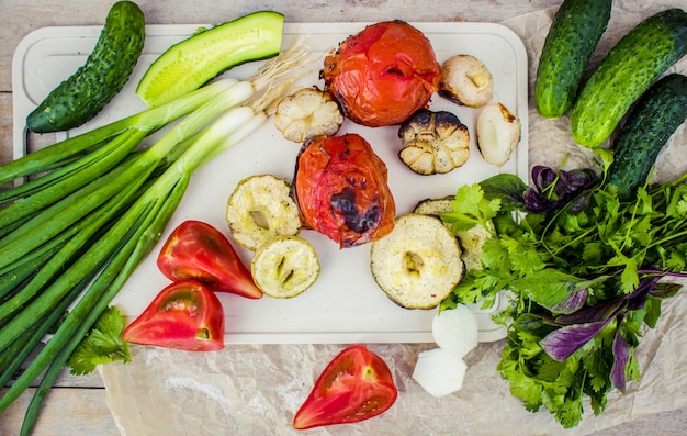 Wings and grilled vegetables. selective focus.