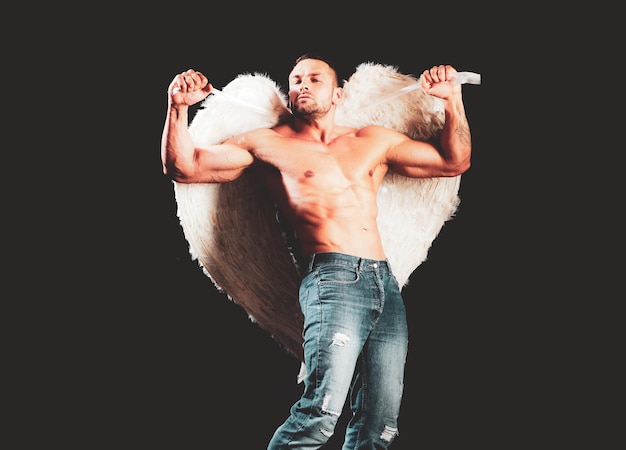 Wings, man angel. Sexy guy with muscular body and bare torso.