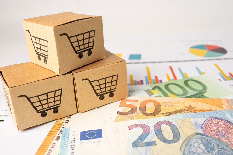 Foto winkelwagen logo op doos met eurobankbiljetten achtergrond