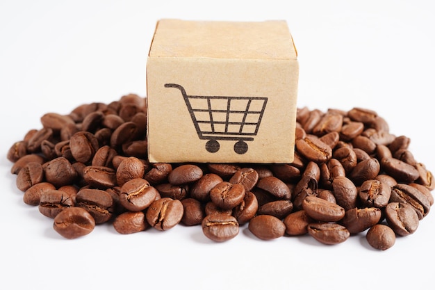 Winkelwagendoos op koffiebonen die online winkelen voor export of import