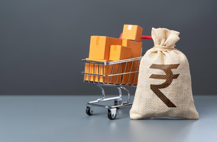 Foto winkelwagentje met dozen en een tas met geld in indiase rupien