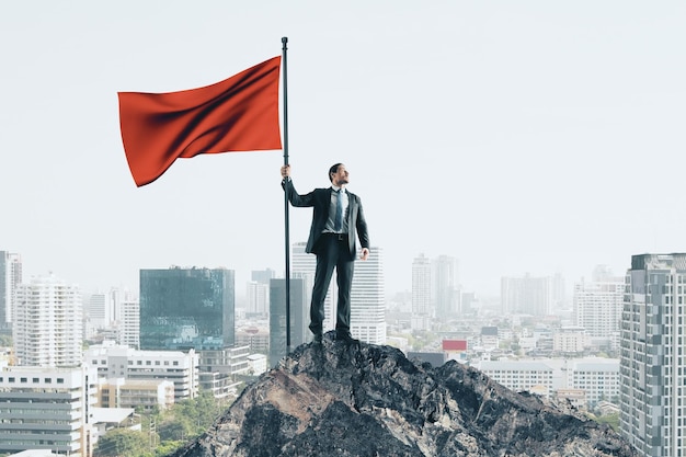 Photo winner businessman with red flag