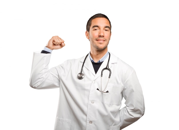 Winner doctor against white background