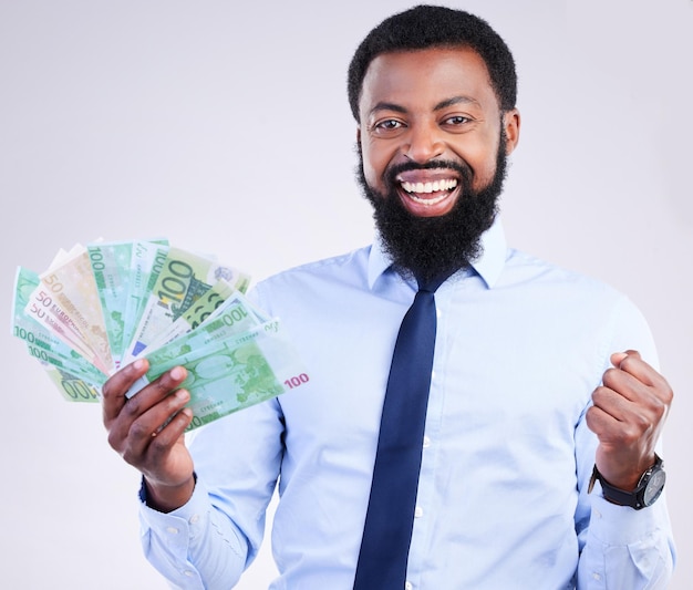 winner money and portrait of black man in studio for lottery investment and wealthy success payment and profit with male holding cash isolated on white background for cashback salary and rich