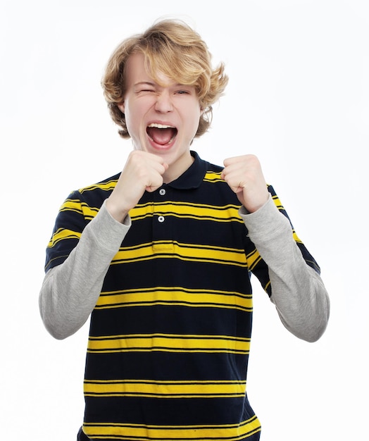 Photo winner portrait of laughing teenage boy gesturing