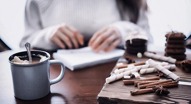 Winter breakfast A cup of hot chocolate with marshmallows and freshly baked cookies