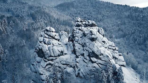 Winter in Carpathian Mountains. High-altitude aerial shot.