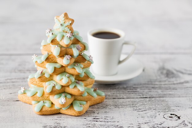 Winter coffee with gingerbread tree cookies