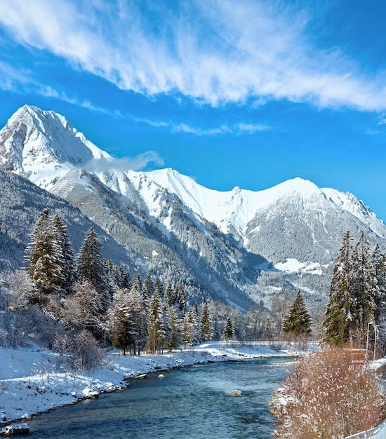 Winter country landscape with mountains and river