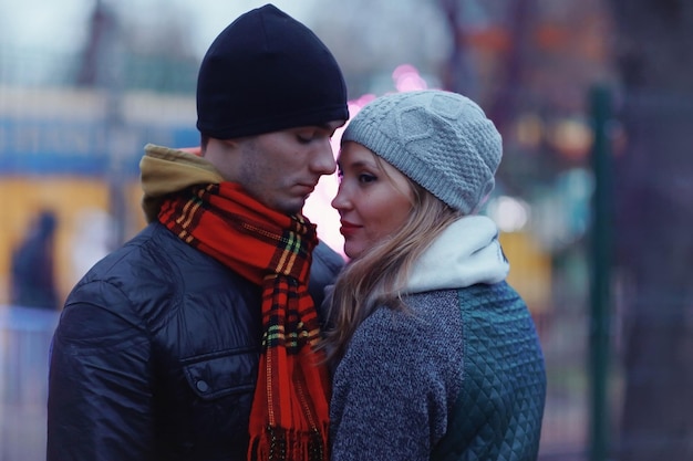 Winter couple walking man and woman, young